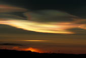 Nacreous, Mother of Pearl, or PSC, Polar Stratospheric Clouds. Believed to be ice and Nitric acid, these react to produce clorine & bromine, from CFCs, which directly destroy ozone molecules. Antarctica.