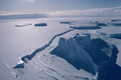 Huge iceberg grounded and frozen in at edge of Riiser-Larsen Ice Shelf. Antarctica