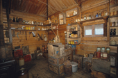 Stores in the corner by the stove. Shackleton's Nimrod expedition hut at Cape Royds Ross Island. Antarctica.