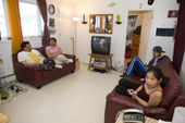 The Metuq family relaxing at their home in the Inuit community of Pangnirtung. Nunavut, Canada. 2008