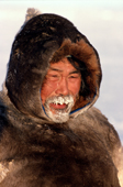 Tatigat, an Inuit hunter, his breath frozen into his beard. Igloolik, Nunavut, Canada. 1993
