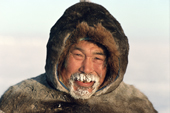 Tatigat, an Inuit hunter, his breath frozen into his beard. Igloolik, NWT, Canada. 1993