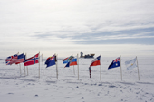 South Pole Telescope and Dark sector Lab beyond the cermonial South Pole and Flags of Nations. Antarctica