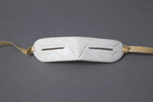 Traditional inuit snow goggles or sunglasses made from Musk Oxen horn with ties of sealskin. To prevent snow blindness. Greenland