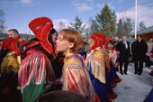 Sami girls congratulate each other after their confirmation service. Sapmi. Karasjok. North Norway. 2000