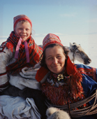 Sitting on a sled, Inga-Anna & her aunt Karen-Anna on a Sami spring migration. Kautokeino. North Norway. 1972