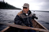Uniam, an Innu hunter, travelling by canoe on Burnwood lake in Southern Labrador.Canada. 1997