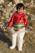Anne Sofie, a young Inuit girl from Qaanaaq, in traditional dress on her third birthday. Northwest Greenland. 2008