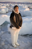 Sofie Jensen, a young Inuit woman, dressed in traditional sealskin clothing. Qaanaaq, Northwest Greenland. 2008