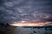Dramatic Asperatus cloud formation as a storm builds at dawn over Inglefield Bay. Northwest Greenland. 2008
