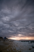 Dramatic Asperatus cloud formation as a storm builds at dawn over Inglefield Bay. Northwest Greenland. 2008