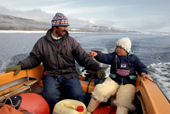Jakob Kristiansen out hunting with his grandson in a boat during the summer. Moriussaq, N.W. Greenland. 1997