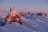 Snowdrifts against houses in the Inuit community of Savissivik. N.W. Greenland. 1998