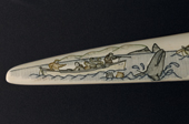 First of a sequence of 7 images of a whaling story engraved on walrus ivory by Gallina Irgutegina. Uelen, Chukotka, Siberia. 2004