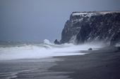 Waves pound Cape Dezhnev during an autumn storm. Uelen, Chukotka, Siberia, Russia. 2004