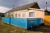 A brightly coloured wooden house in the village of Pogost. Ryazan Province, Russia. 2006