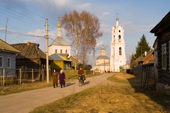 Villagers returning home after an evening church service in Pogost. Ryazan Province, Russia. 2006
