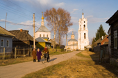 Villagers returning home after an evening church service in Pogost. Ryazan Province, Russia. 2006