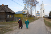 Elderly women returning home after an evening church service in the village of Pogost. Ryazan Province, Russia. 2006