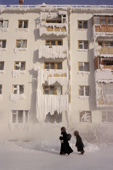 An apartment block coated in ice and frost during the winter in Yakutsk. Yakutia, Republic of Sakha, Russia. (2001)