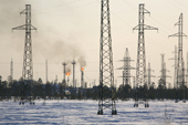 Pylons and gas flares in the Vingoyarhinsky oil fields. Purovsky Region, Yamal, Western Siberia.