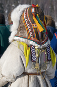 A Nenets woman wearing traditional winter dress at a reindeer herders festival in the Yamal. Western Siberia, Russia