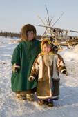 Paedavyaku, a Nenets boy, with his sister Yaline, at their family's winter camp in the Yamal. Western Siberia, Russia