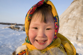 Yaline Laptander, a young Nenets girl, at her family's winter camp in the Yamal. Western Siberia, Russia