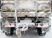 The snow covered rear of a Ural truck travelling on a winter road in the Yamal. Western Siberia, Russia