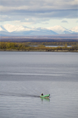 A Budarka (boat) on the River Ob near Gornoknyazevsk, with the Ural Mountains in the background. Yamal, Western Siberia, Russia