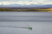 A Budarka (boat) on the River Ob near Gornoknyazevsk, with the Ural Mountains in the background. Yamal, Western Siberia, Russia