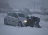 Car stuck in blizzard Reykjavik Iceland