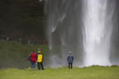 Tourists at Seljalandsfoss waterfall, South Coast, Iceland