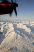 Aerial view from a Dash 7 of mountains and glaciers on Greenland's West Coast north of Ilulissat. West Greenland
