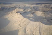 Aerial view of sedimentary  mountains and glaciers on Greenland's West Coast north of Ilulissat. West Greenland