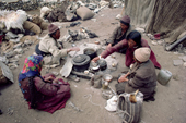 Herder's family eat goat meat & Yak butter. Nimaling Plateau. Ladakh. India.